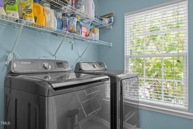 2012 Sterling Hill Dr, Fuquay Varina, NC 27526 - clothes washing area featuring washing machine and dryer and plenty of natural light