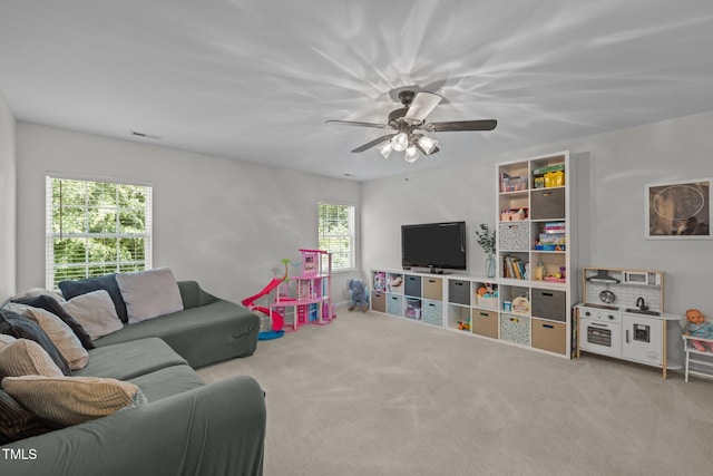 2012 Sterling Hill Dr, Fuquay Varina, NC 27526 - carpeted living area with a ceiling fan