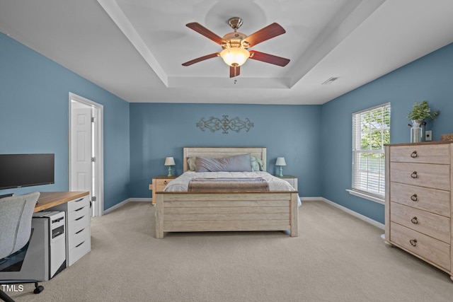 2012 Sterling Hill Dr, Fuquay Varina, NC 27526 - bedroom featuring a tray ceiling, light colored carpet, and baseboards