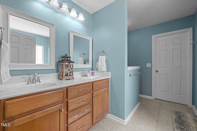 2012 Sterling Hill Dr, Fuquay Varina, NC 27526 - full bathroom featuring tile patterned flooring, double vanity, and baseboards