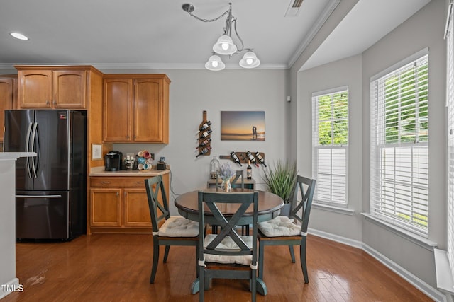 2012 Sterling Hill Dr, Fuquay Varina, NC 27526 - dining room featuring dark wood-type flooring, ornamental molding, baseboards, and recessed lighting