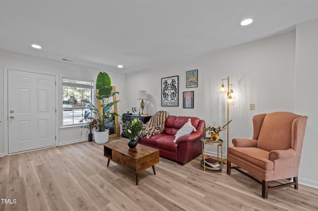145 Coleridge Ct, Carrboro, NC 27510 - living area featuring light wood finished floors, recessed lighting, and baseboards