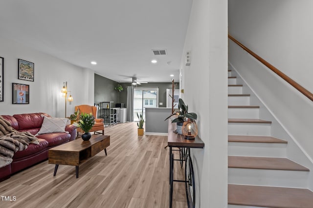 145 Coleridge Ct, Carrboro, NC 27510 - living area with wood finished floors, stairs, recessed lighting, a ceiling fan, and baseboards