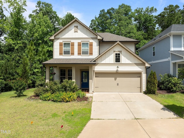 111 Chapel Run Way, Chapel Hill, NC 27517 - view of front facade featuring board and batten siding, a front lawn, concrete driveway, roof with shingles, and an attached garage