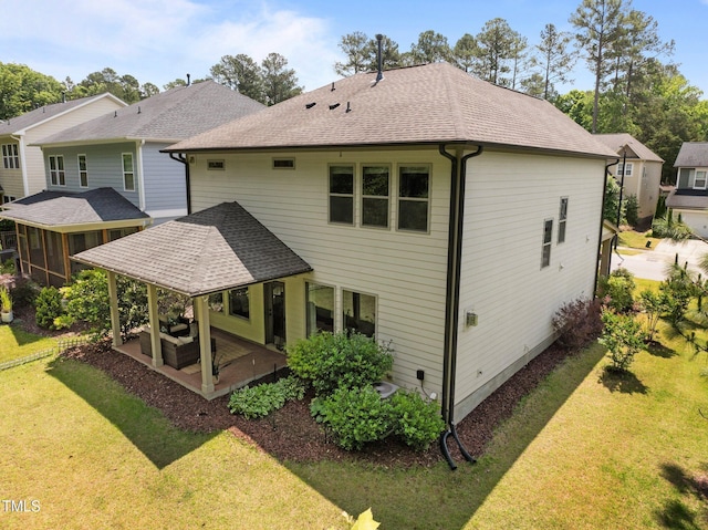 111 Chapel Run Way, Chapel Hill, NC 27517 - back of property with a yard, a shingled roof, and a patio