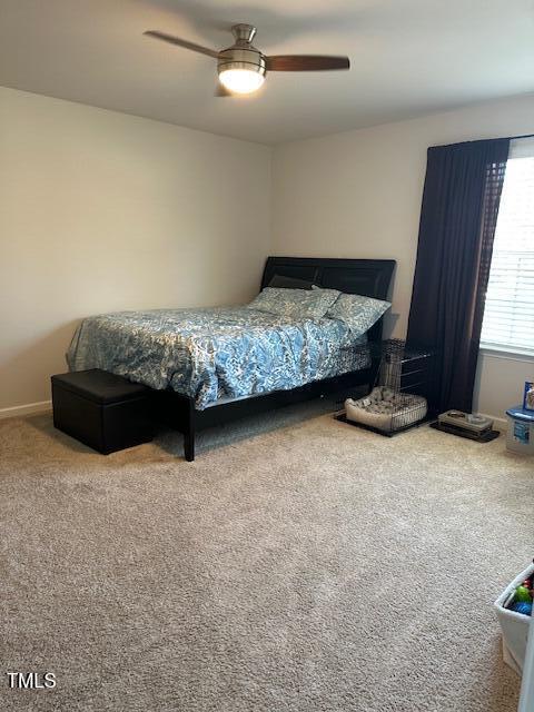 bedroom with carpet floors and ceiling fan