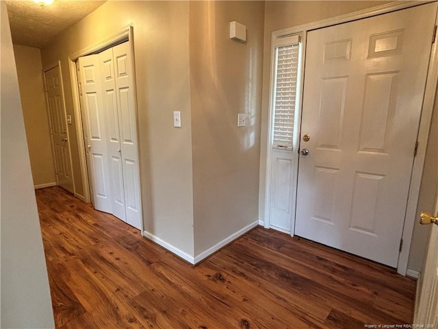 5413 Heather St, Hope Mills, NC 28348 - entrance foyer with baseboards and dark wood finished floors