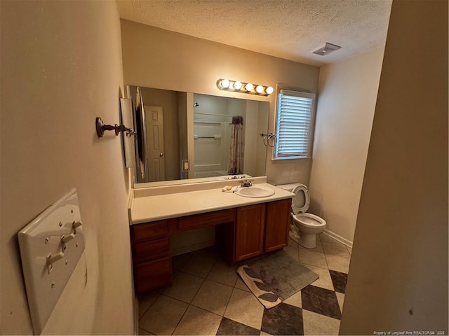 5413 Heather St, Hope Mills, NC 28348 - full bathroom with a textured ceiling, vanity, curtained shower, and toilet