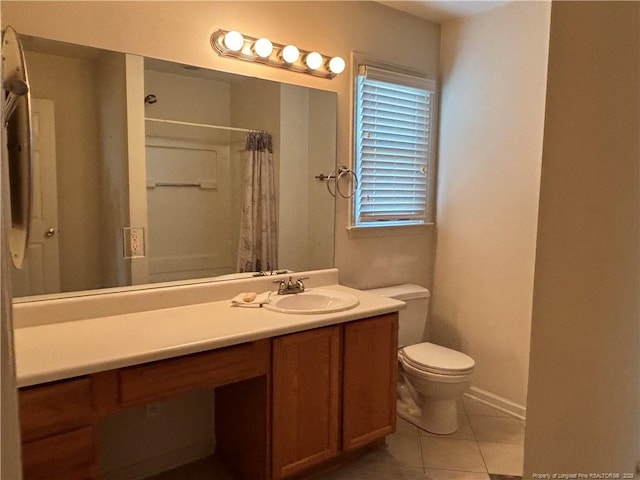 5413 Heather St, Hope Mills, NC 28348 - bathroom featuring tile patterned floors, toilet, vanity, and a shower with curtain