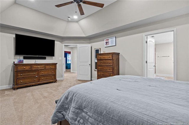 carpeted bedroom with lofted ceiling, baseboards, recessed lighting, ceiling fan, and ensuite bathroom