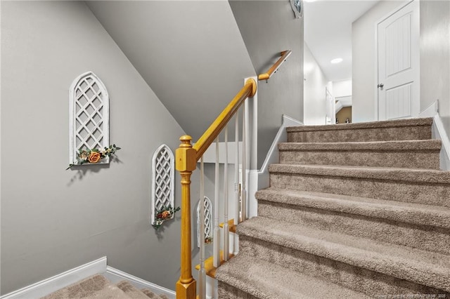 stairway with baseboards