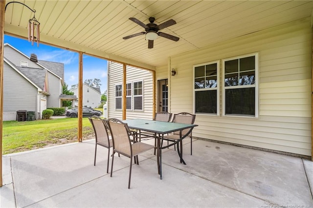 view of patio featuring outdoor dining space and a ceiling fan