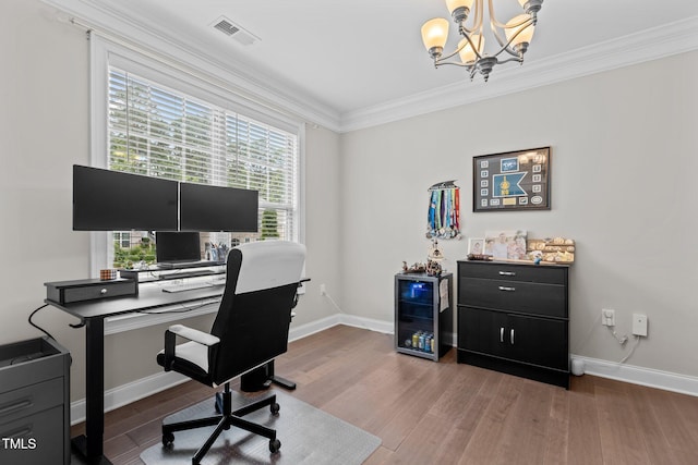home office with wood finished floors, a chandelier, crown molding, baseboards, and wine cooler