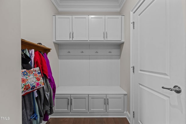 mudroom featuring ornamental molding and dark wood-type flooring