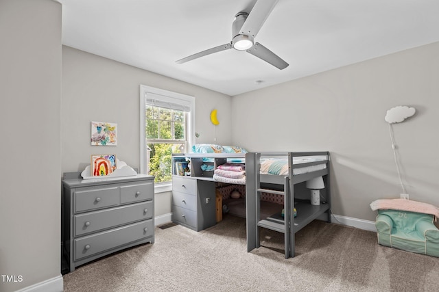 bedroom with baseboards, light colored carpet, and ceiling fan