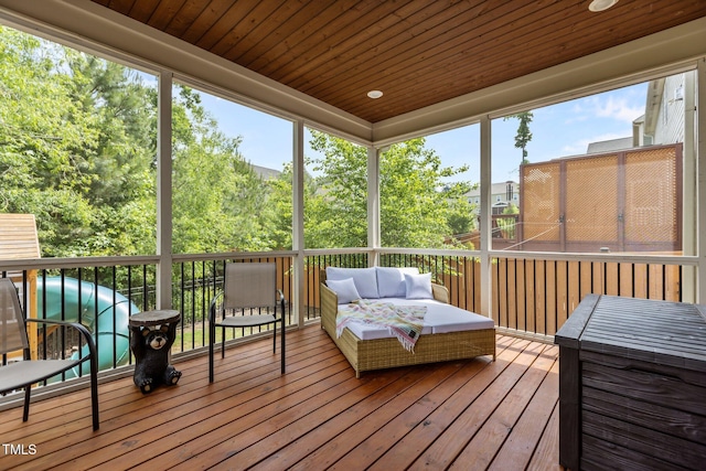 sunroom with an outdoor hangout area and healthy amount of natural light