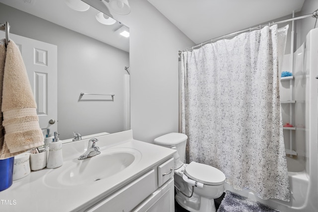 full bath featuring toilet, vanity, and shower / tub combo with curtain