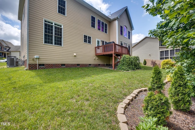 rear view of house with crawl space, a lawn, central AC unit, and a wooden deck
