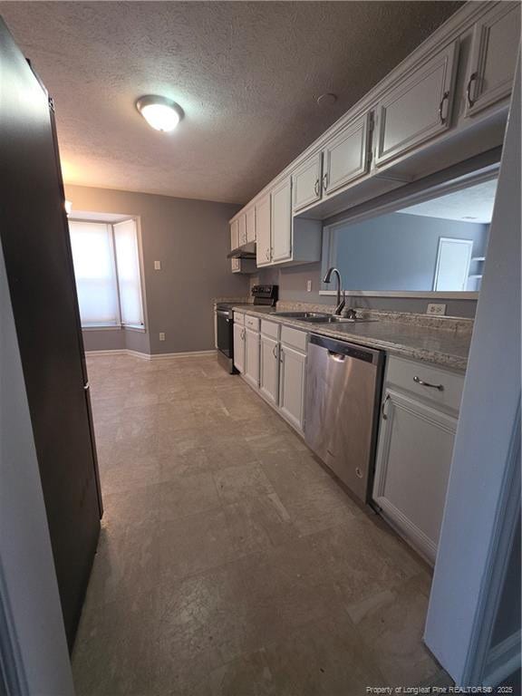 2604 Burke Ln, Fayetteville, NC 28306 - kitchen featuring stainless steel dishwasher, range with electric cooktop, a textured ceiling, a sink, and light flooring