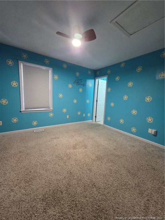 2604 Burke Ln, Fayetteville, NC 28306 - unfurnished room featuring carpet floors, ceiling fan, and attic access