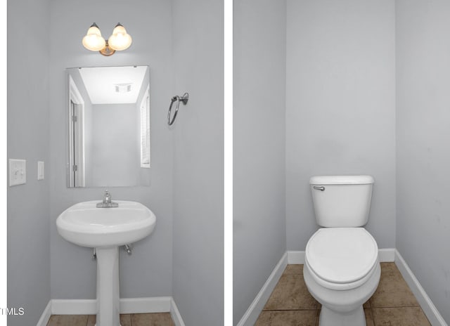 half bath with toilet, baseboards, and tile patterned flooring
