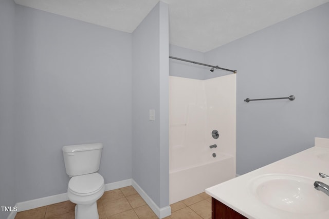 bathroom featuring double vanity, toilet, bathing tub / shower combination, and tile patterned floors