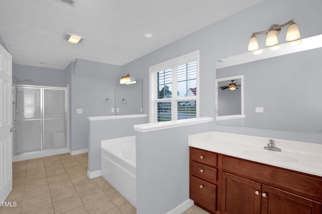 bathroom with a stall shower, vanity, a garden tub, tile patterned floors, and ceiling fan