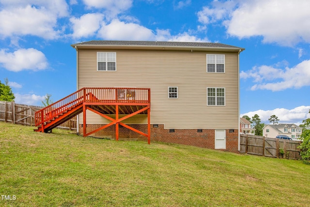 rear view of house featuring crawl space, stairs, and a wooden deck