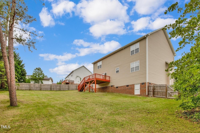 rear view of property featuring a wooden deck, stairs, and crawl space