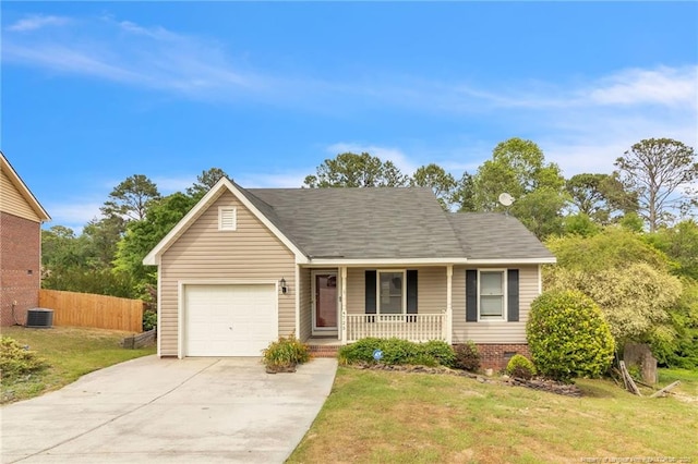 4725 Grandison Ct, Hope Mills, NC 28348 - view of front of house featuring a porch, an attached garage, concrete driveway, and cooling unit