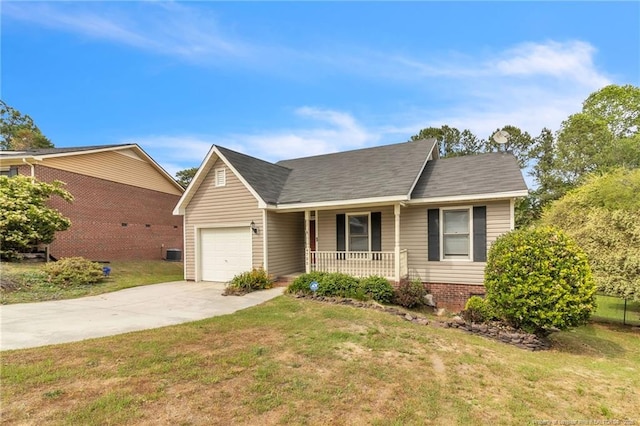 4725 Grandison Ct, Hope Mills, NC 28348 - view of front facade featuring a porch, an attached garage, driveway, and a front lawn
