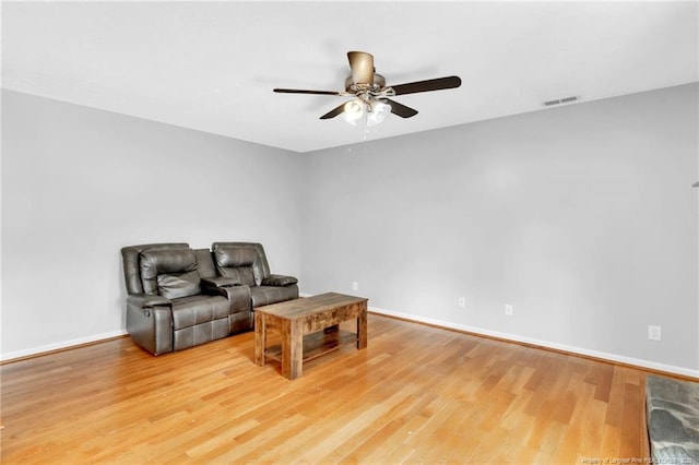4725 Grandison Ct, Hope Mills, NC 28348 - living area with ceiling fan, light wood-type flooring, and baseboards