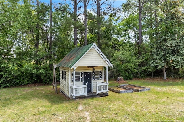 4725 Grandison Ct, Hope Mills, NC 28348 - view of outbuilding with an outbuilding and a garden