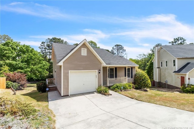 4725 Grandison Ct, Hope Mills, NC 28348 - view of front of house featuring covered porch, a garage, and driveway