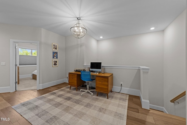 office area featuring light wood-style flooring, baseboards, a chandelier, and recessed lighting