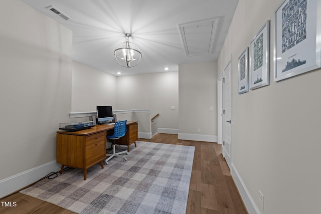 office area featuring attic access, light wood-style floors, recessed lighting, and baseboards
