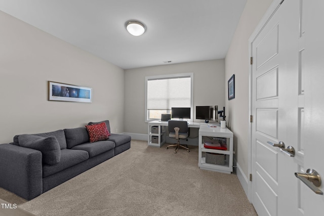 carpeted office with baseboards