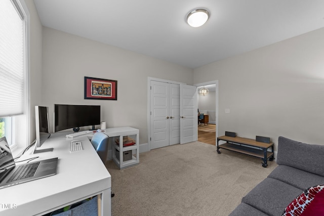 carpeted office with baseboards