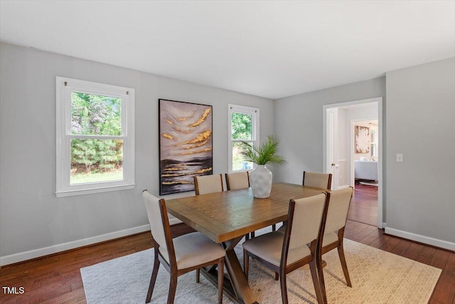 3418 Carriage Trl, Hillsborough, NC 27278 - dining area with hardwood / wood-style flooring and baseboards