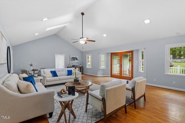 3418 Carriage Trl, Hillsborough, NC 27278 - living area featuring light wood-style floors, lofted ceiling, a ceiling fan, baseboards, and french doors
