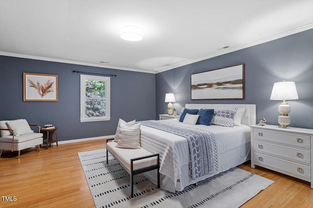 3418 Carriage Trl, Hillsborough, NC 27278 - bedroom featuring crown molding, light wood-type flooring, and baseboards