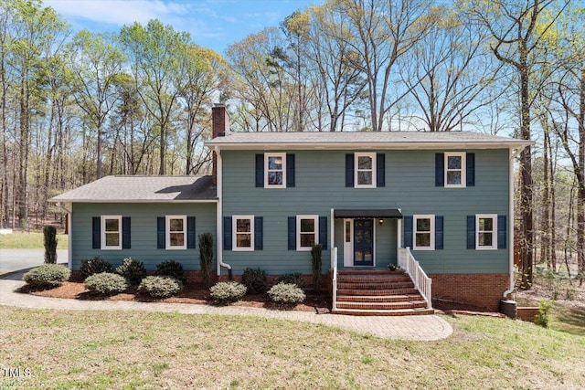 3418 Carriage Trl, Hillsborough, NC 27278 - colonial home featuring a chimney and a front yard