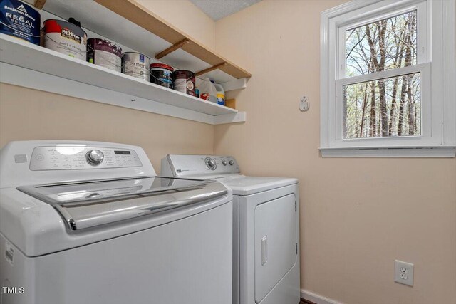 3418 Carriage Trl, Hillsborough, NC 27278 - laundry room with washing machine and clothes dryer