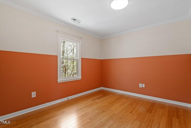 3418 Carriage Trl, Hillsborough, NC 27278 - empty room featuring wood finished floors, baseboards, and ornamental molding