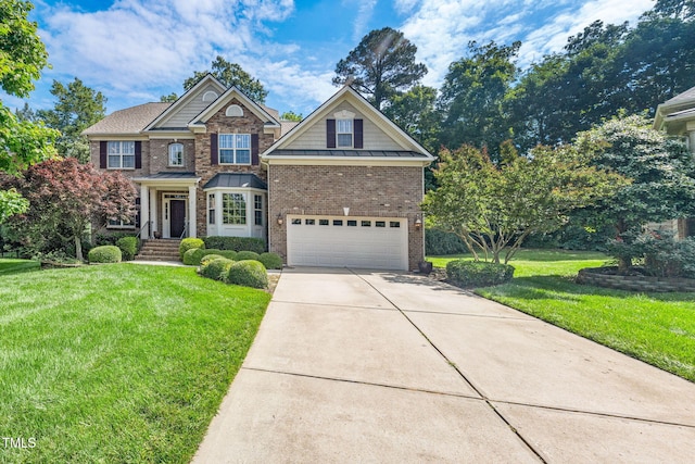 view of front facade with an attached garage, brick siding, a front lawn, driveway, and a standing seam roof