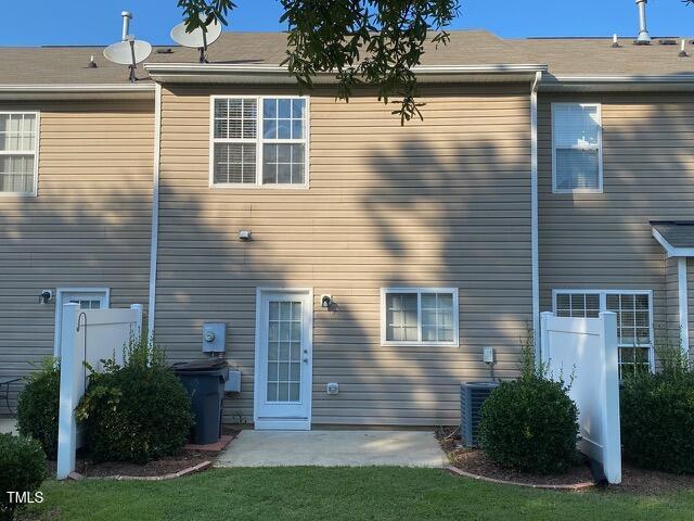 21 Suncrest Ct, Durham, NC 27703 - back of house with a patio area and central AC unit
