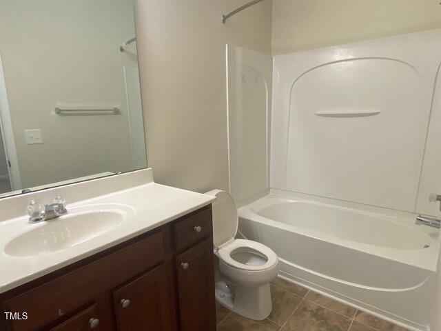 21 Suncrest Ct, Durham, NC 27703 - full bathroom with toilet, vanity, tile patterned flooring, and bathtub / shower combination