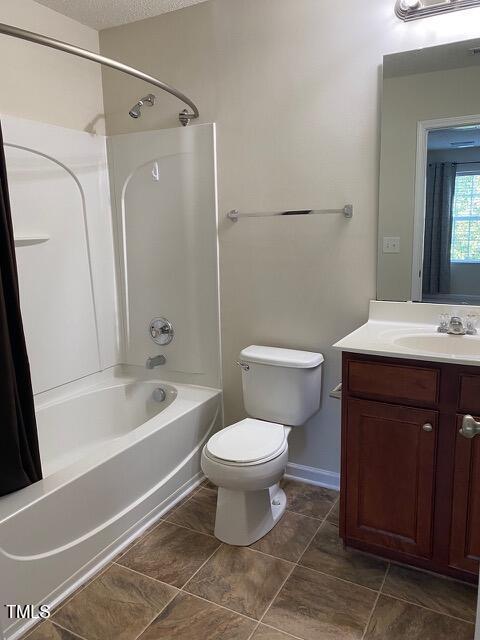 21 Suncrest Ct, Durham, NC 27703 - full bathroom with vanity, shower / bathtub combination, and toilet