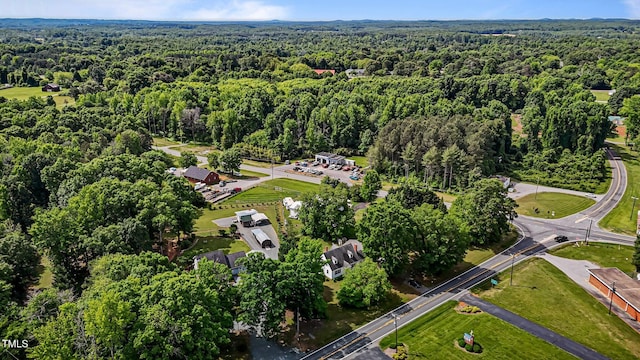 view of property location featuring a heavily wooded area