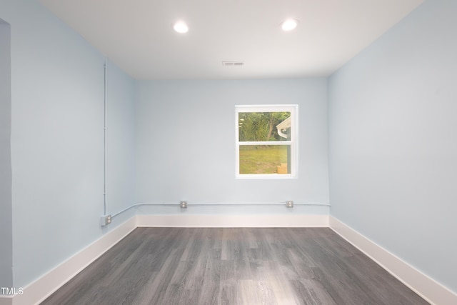 1917 Tucker St, Burlington, NC 27215 - spare room with recessed lighting, wood finished floors, and baseboards